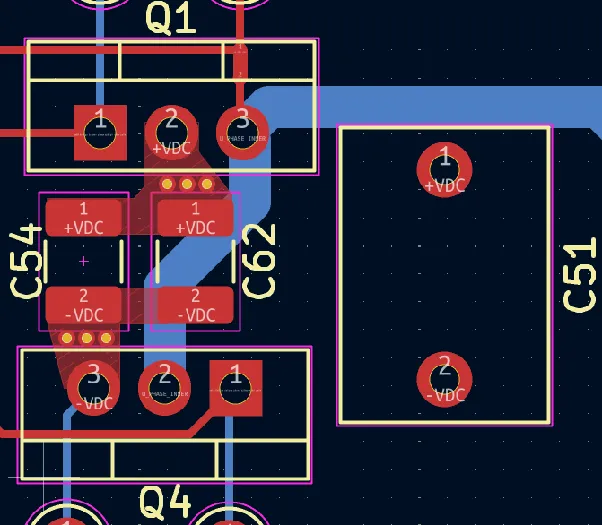 Close-up of one half-bridge on the V1 board showing the tight switch loop and HF capacitors